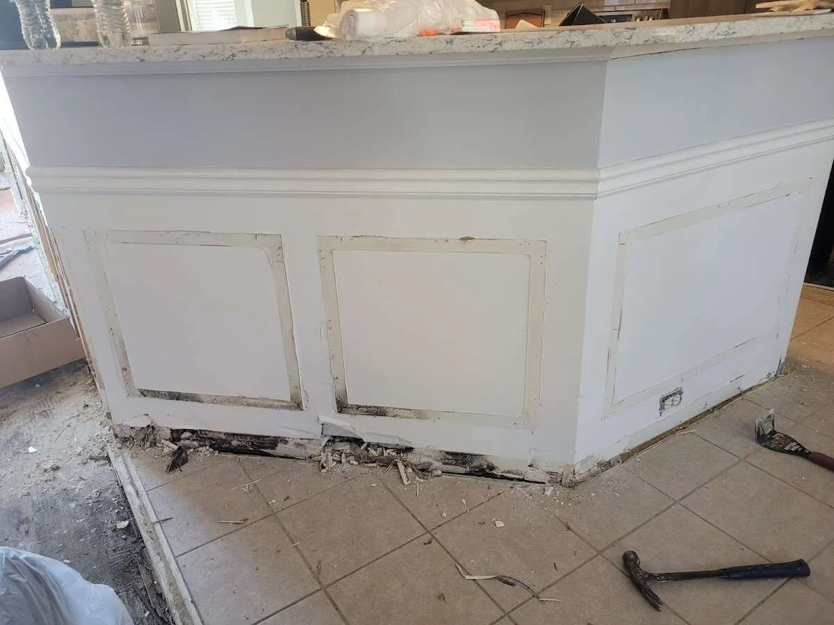Water damage and mold on kitchen during Storm Damage Restoration in Lindenhurst